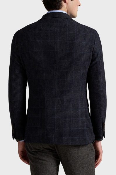 Чоловічий піджак в клітинку
