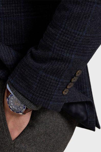 Чоловічий піджак в клітинку